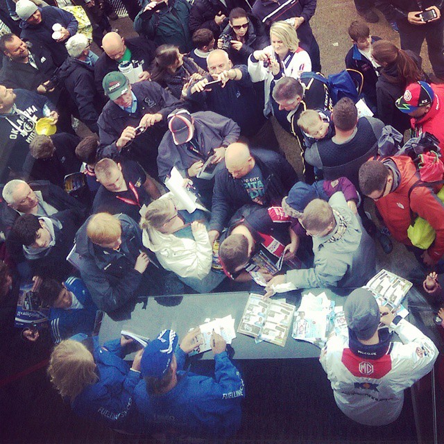 Jason Plato and Sam Tordoff sign autographs during a busy BTCC pitlane walkabout at Brands Hatch.